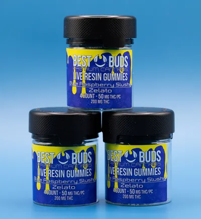 Best Buds live resin gummies in three jars on a blue background